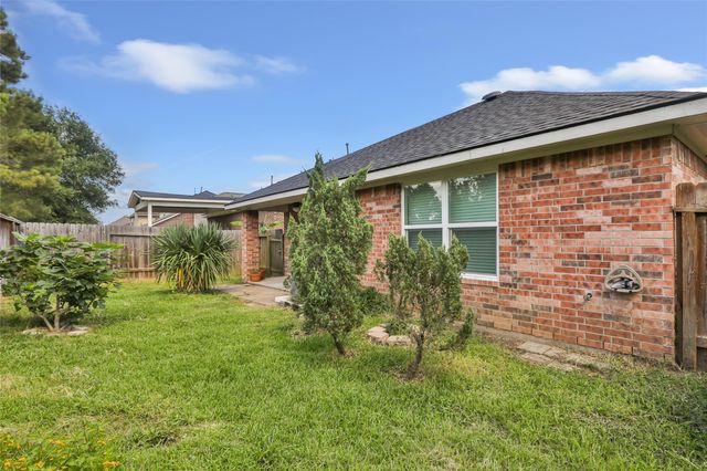 10331 Whisper Bluff Drive, Humble, TX 77396