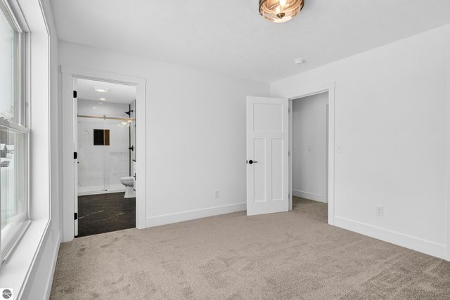 2134 Cottonwood Avenue, Grawn, MI 49637