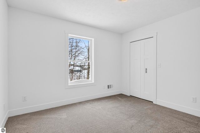 2134 Cottonwood Avenue, Grawn, MI 49637