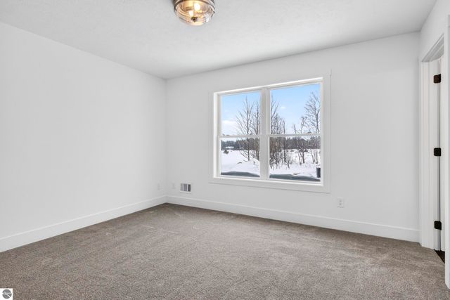 2134 Cottonwood Avenue, Grawn, MI 49637