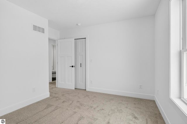 2134 Cottonwood Avenue, Grawn, MI 49637