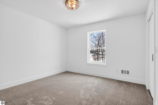 2134 Cottonwood Avenue, Grawn, MI 49637