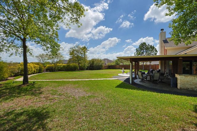 9102 Night Beacon Point Drive, Spring, TX 77379