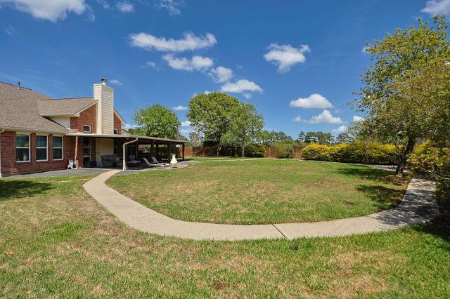 9102 Night Beacon Point Drive, Spring, TX 77379