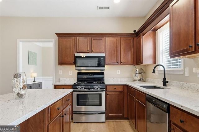 6459 Millstone Cove Drive, Flowery Branch, GA 30542