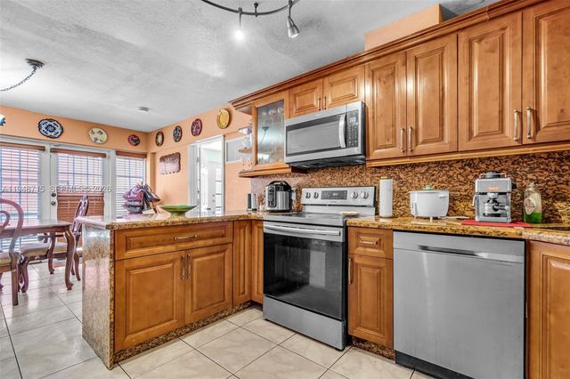 9085 Grand Canal Dr, Miami, FL 33174