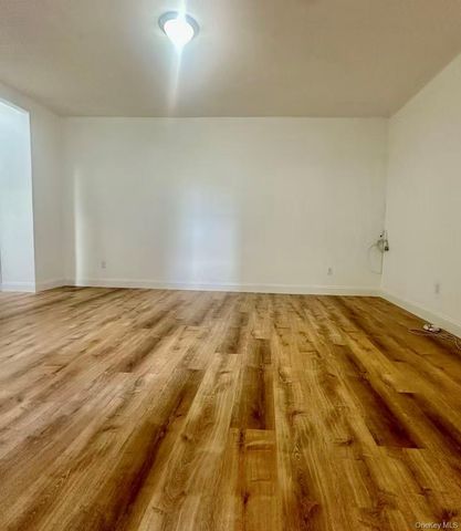 61-09 39th Avenue, Woodside, NY 11377