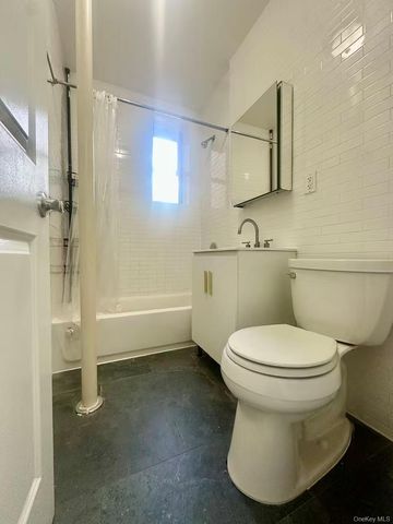 61-09 39th Avenue, Woodside, NY 11377