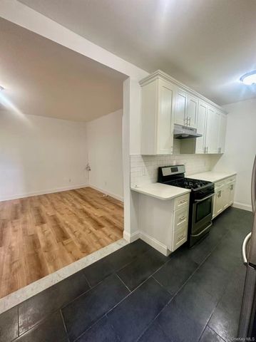 61-09 39th Avenue, Woodside, NY 11377