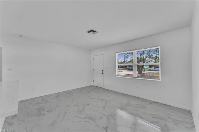 1012 Monroe DR, Lehigh Acres, FL 33936