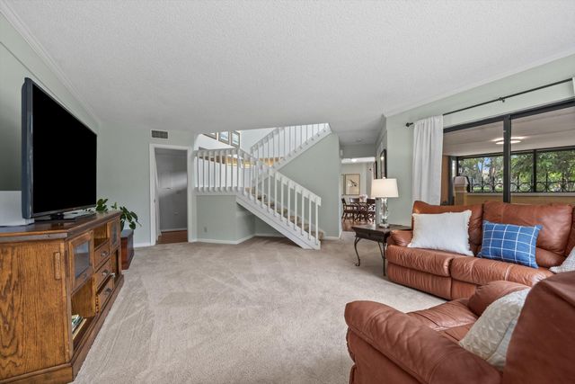 24 Uno Lago Drive, Juno Beach, FL 33408