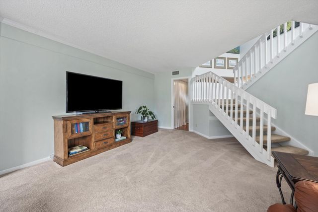 24 Uno Lago Drive, Juno Beach, FL 33408