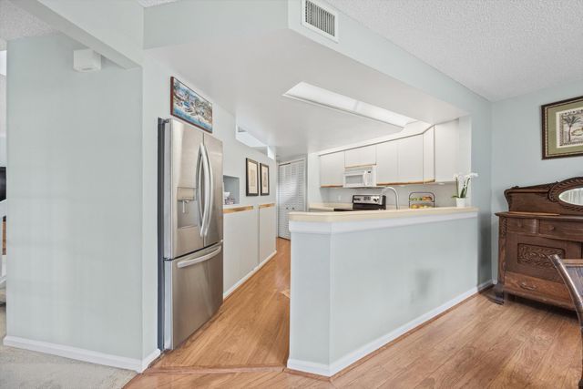 24 Uno Lago Drive, Juno Beach, FL 33408