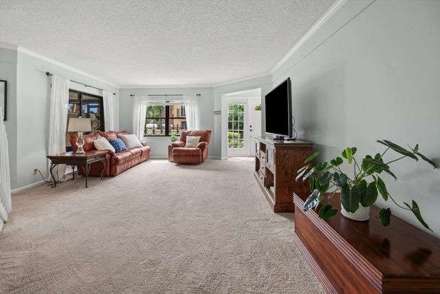 24 Uno Lago Drive, Juno Beach, FL 33408