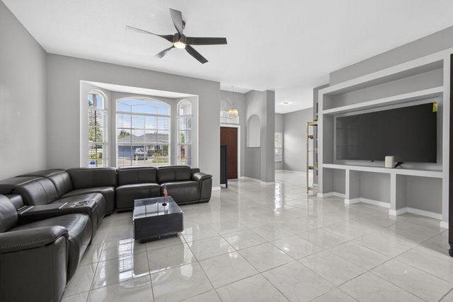 102 Brook Woode Court, Royal Palm Beach, FL 33411