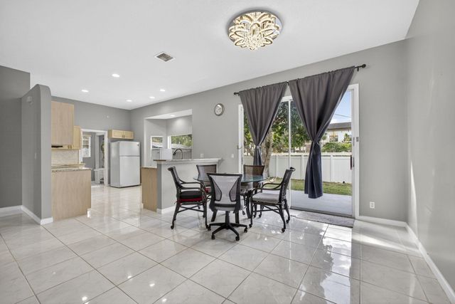 102 Brook Woode Court, Royal Palm Beach, FL 33411