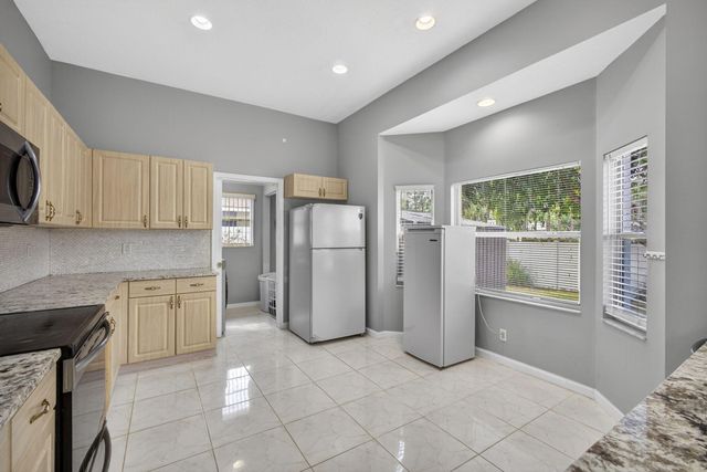 102 Brook Woode Court, Royal Palm Beach, FL 33411