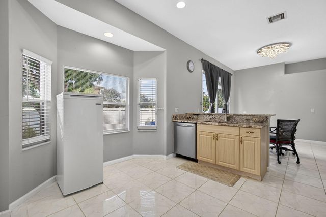 102 Brook Woode Court, Royal Palm Beach, FL 33411