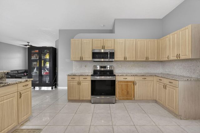 102 Brook Woode Court, Royal Palm Beach, FL 33411