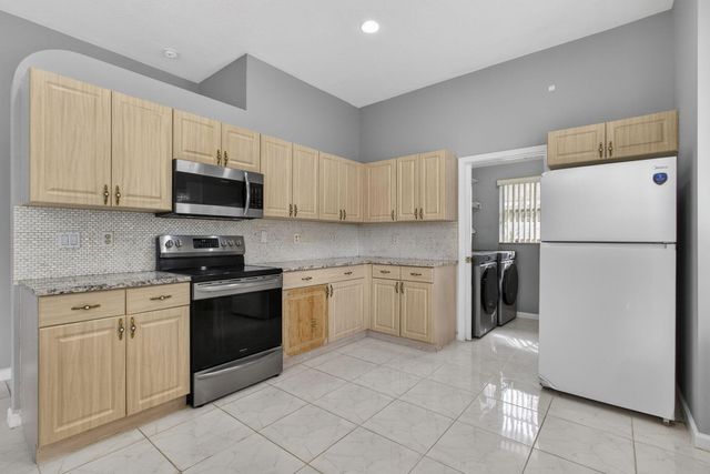 102 Brook Woode Court, Royal Palm Beach, FL 33411