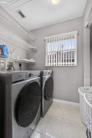 102 Brook Woode Court, Royal Palm Beach, FL 33411