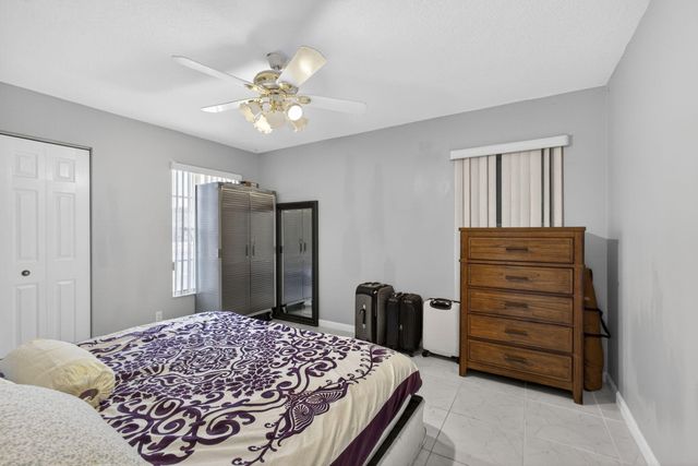 102 Brook Woode Court, Royal Palm Beach, FL 33411