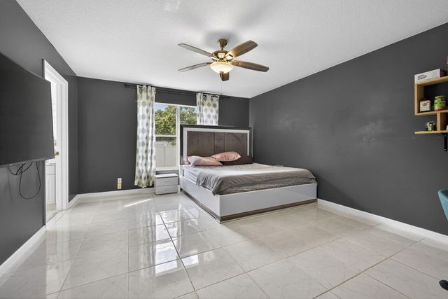 102 Brook Woode Court, Royal Palm Beach, FL 33411