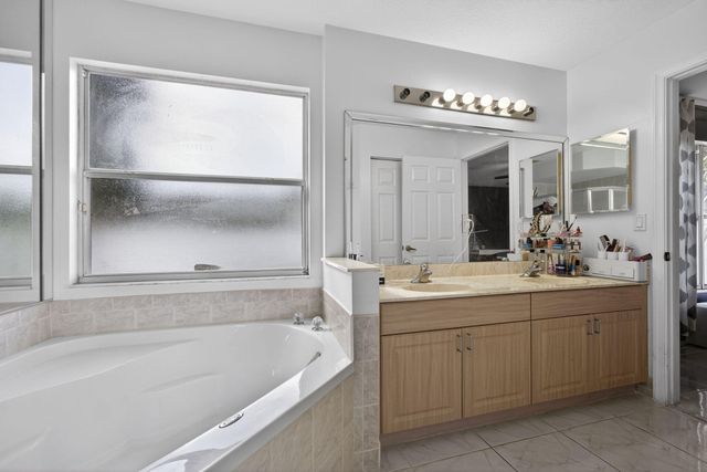 102 Brook Woode Court, Royal Palm Beach, FL 33411