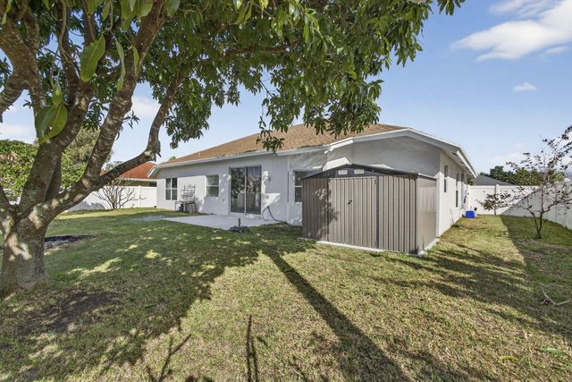 102 Brook Woode Court, Royal Palm Beach, FL 33411