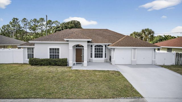 102 Brook Woode Court, Royal Palm Beach, FL 33411