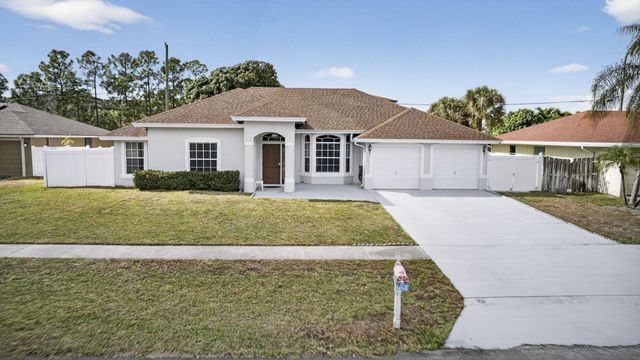 102 Brook Woode Court, Royal Palm Beach, FL 33411