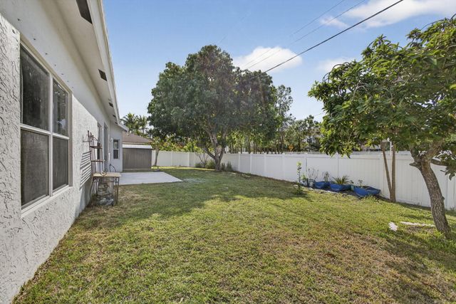 102 Brook Woode Court, Royal Palm Beach, FL 33411