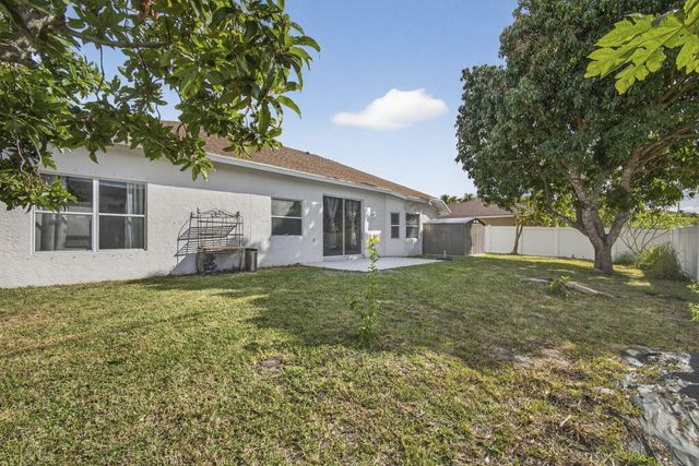 102 Brook Woode Court, Royal Palm Beach, FL 33411