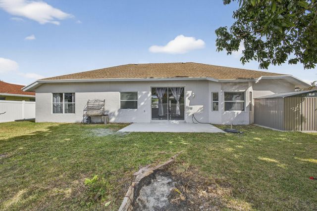 102 Brook Woode Court, Royal Palm Beach, FL 33411