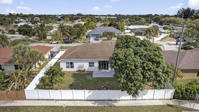 102 Brook Woode Court, Royal Palm Beach, FL 33411