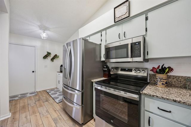 26032 NEWCOMBE CIRCLE, Leesburg, FL 34748