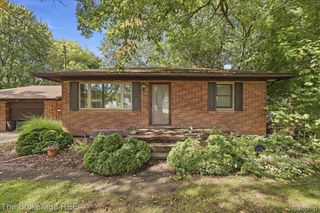 1424 S Belsay Road, Burton, MI 48509