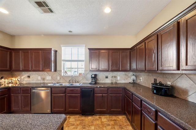 3418 Barbers Hill Road, Highlands, TX 77562