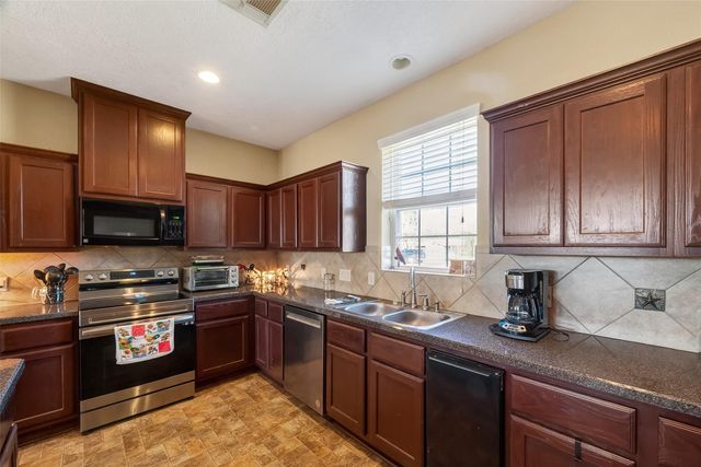 3418 Barbers Hill Road, Highlands, TX 77562