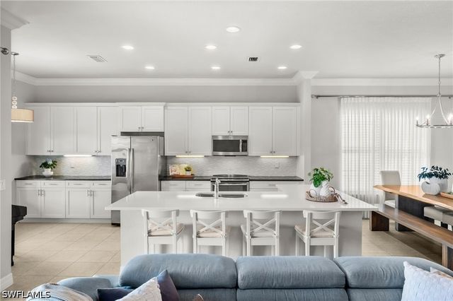 3454 Pacific DR, Naples, FL 34119