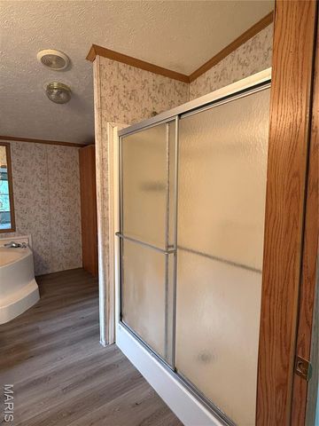 14063 New London Gravel Rd, New London, MO 63459