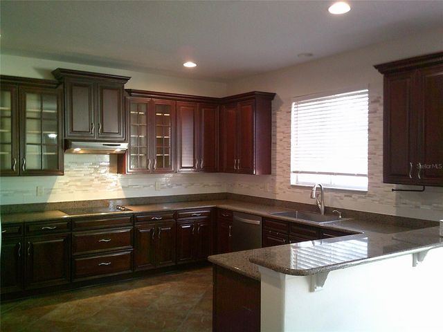 3026 ANQUILLA AVENUE, Clermont, FL 34711