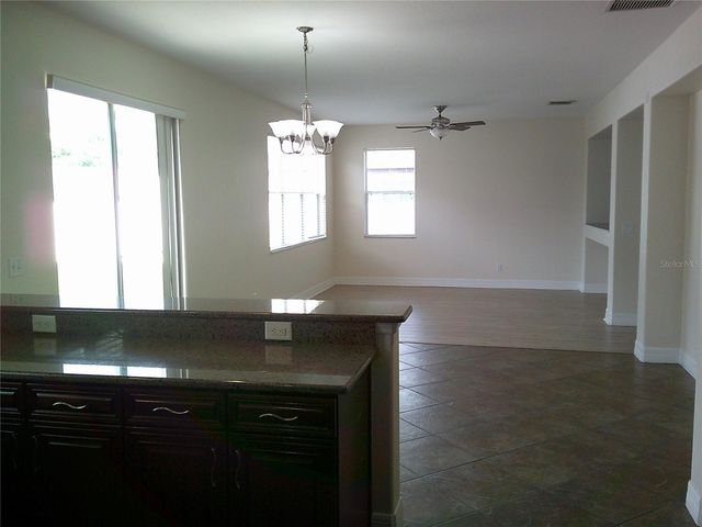 3026 ANQUILLA AVENUE, Clermont, FL 34711