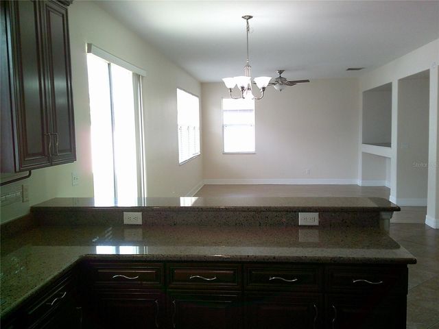 3026 ANQUILLA AVENUE, Clermont, FL 34711