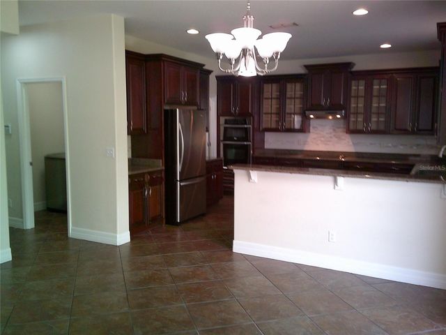 3026 ANQUILLA AVENUE, Clermont, FL 34711