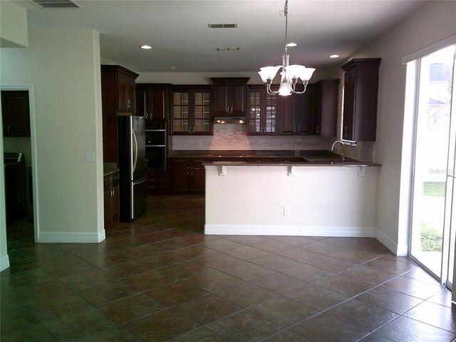 3026 ANQUILLA AVENUE, Clermont, FL 34711
