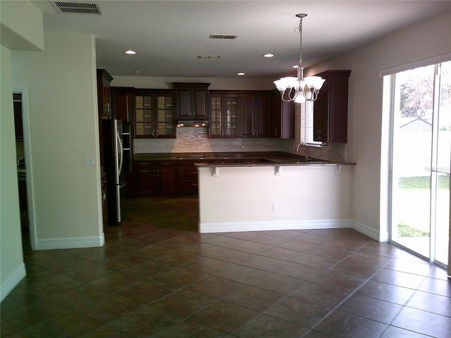 3026 ANQUILLA AVENUE, Clermont, FL 34711