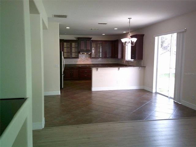 3026 ANQUILLA AVENUE, Clermont, FL 34711