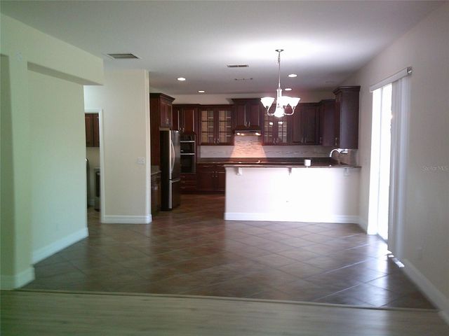 3026 ANQUILLA AVENUE, Clermont, FL 34711