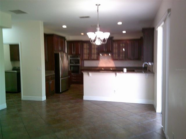 3026 ANQUILLA AVENUE, Clermont, FL 34711